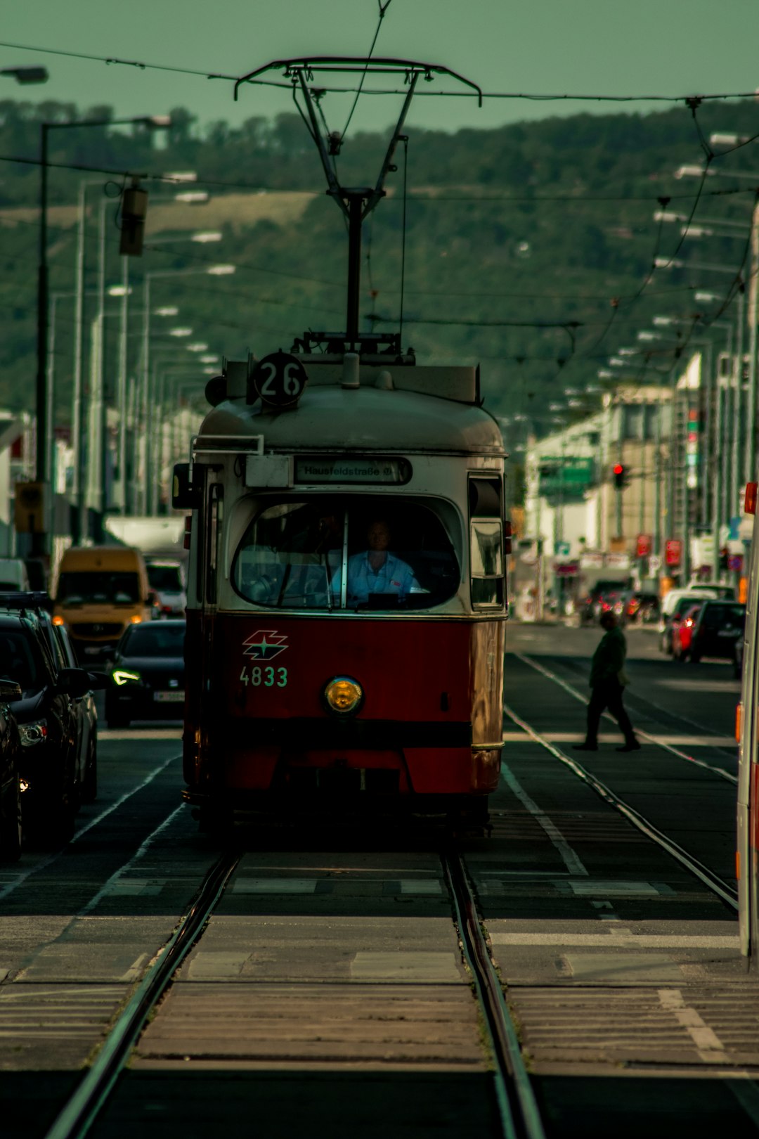 red-and-white-tram-on-the-street-5f6qdgbuyji